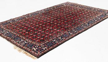 A semi-antique Veramin carpet, ca 315 x 201 cm.