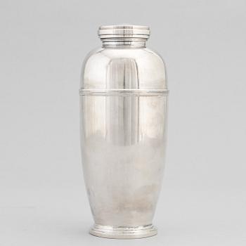 A silver plated shaker, C.G. Hallberg and a set of twelwe cocktail glasses, GAB, second half of the 20th Century.