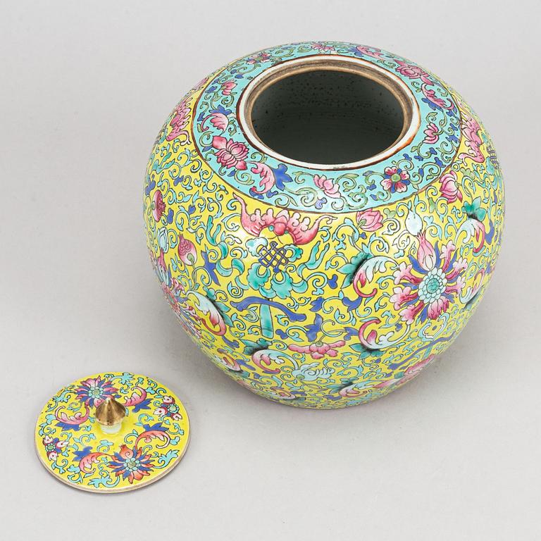 A yellow ground famille rose lotus jar, China, early 20th Century.