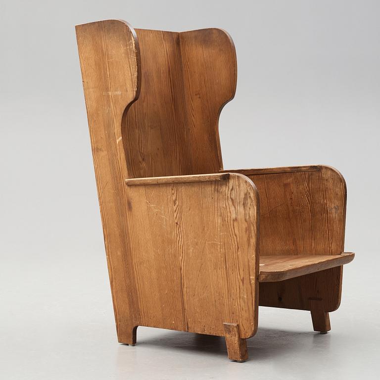 Axel Einar Hjorth, a stained pine "Lovö" armchair, Nordiska Kompaniet, Sweden 1930's.