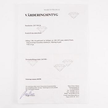 Ring 18K vitguld med briljantslipad diamant.