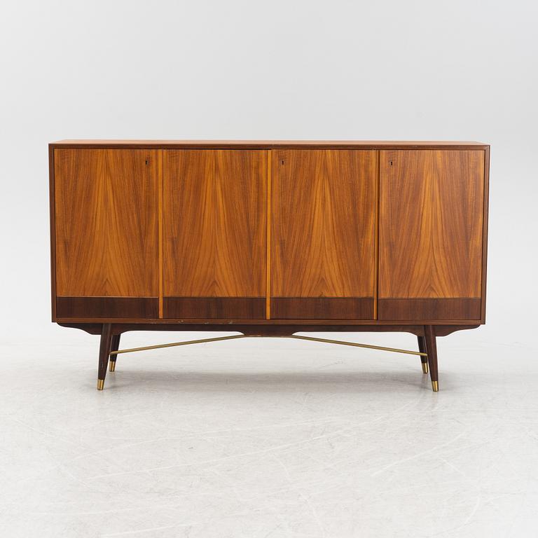 A teak sideboard from the mid 20th century.