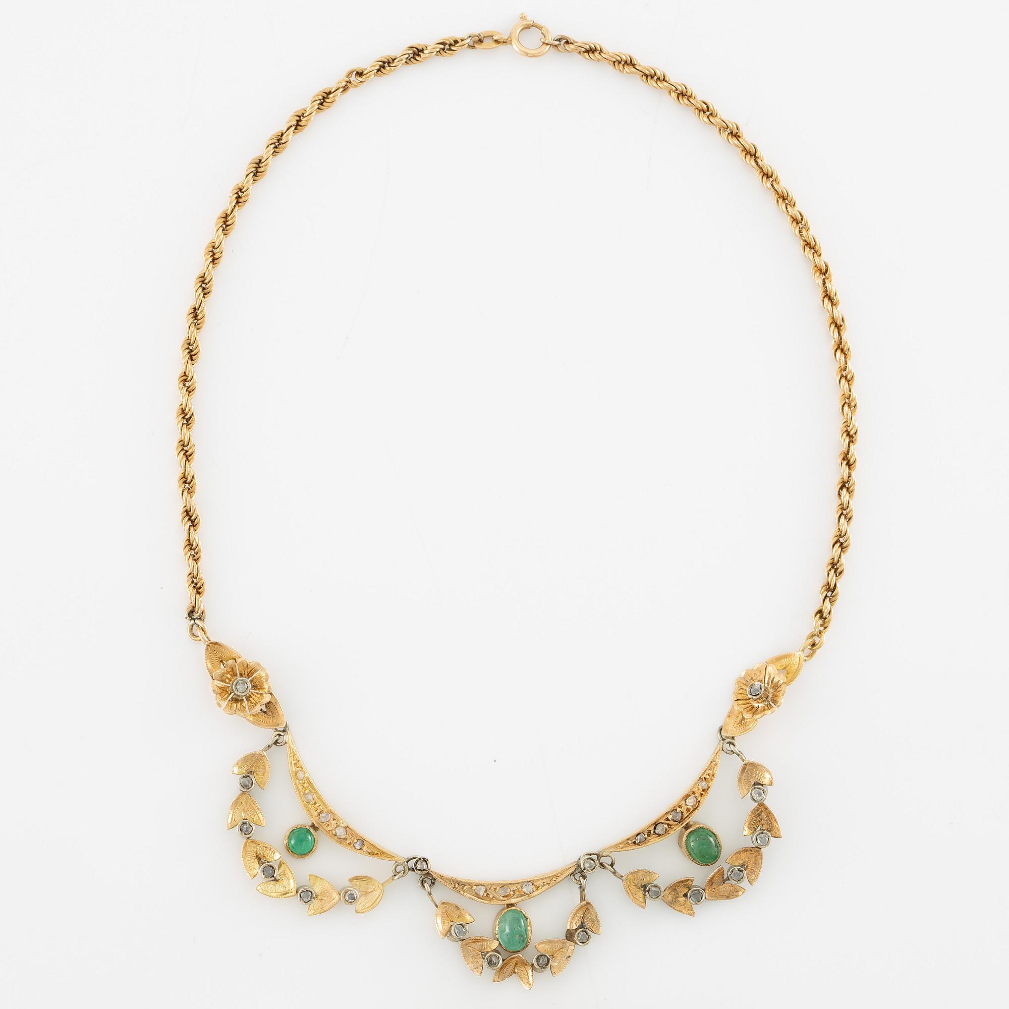 Necklace and bracelet in with floral motif set with cabochon-cut emeralds and rose-cut diamonds.