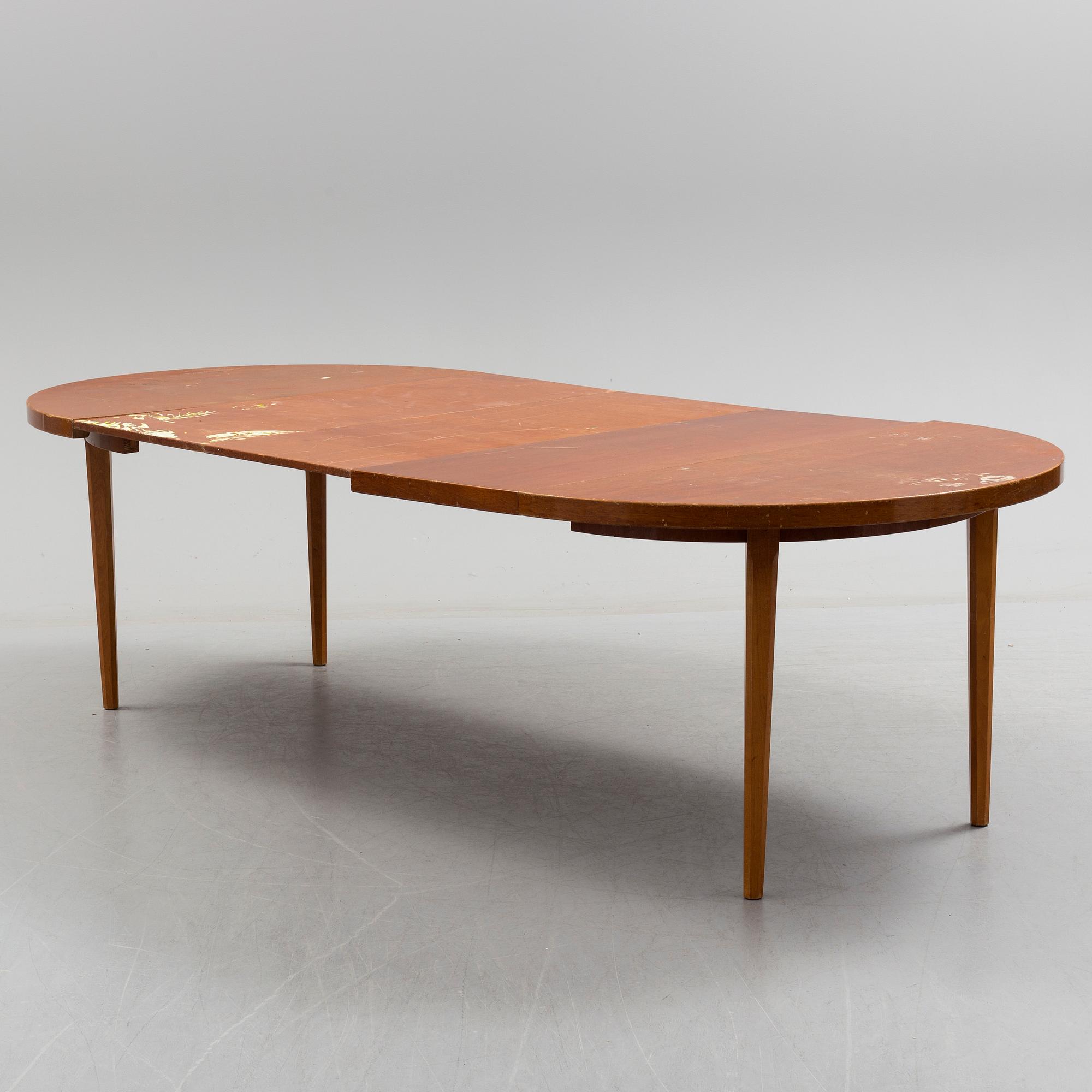 A 1940s mahogany veneer table.