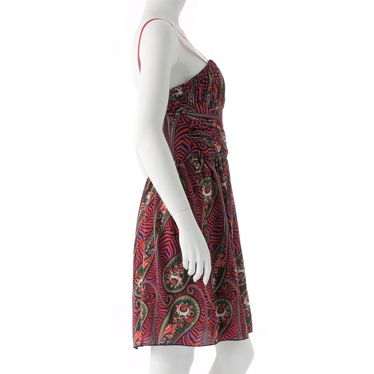 ANNA SUI, a paisley print sundress in pink and purple silk.