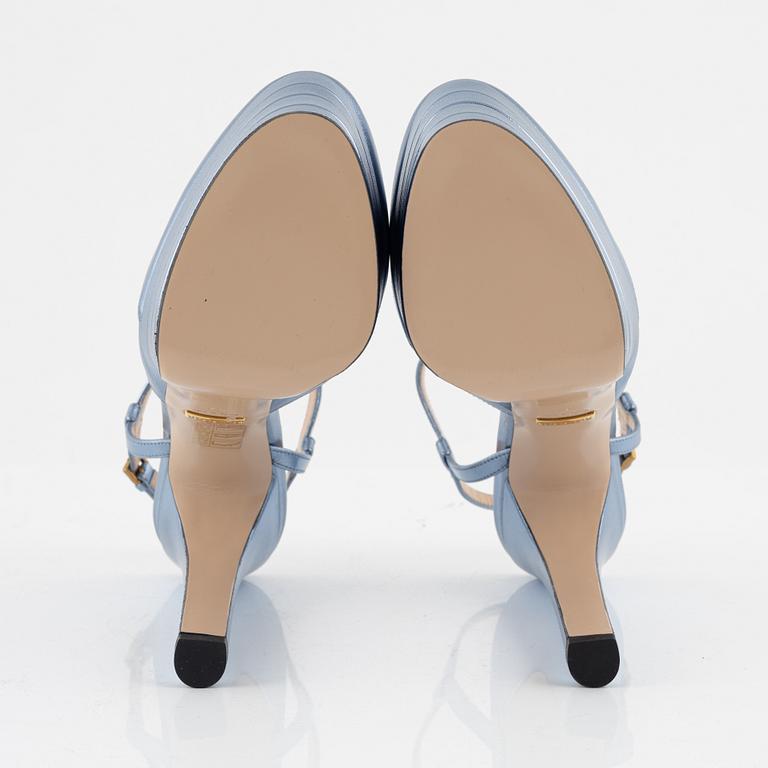 Gucci, a pair of baby blue metalic leather high heel shoes, 2016, size 37.