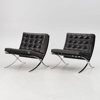 Ludwig Mies van der Rohe, a pair of  "Barcelona" lounge chairs, Knoll.