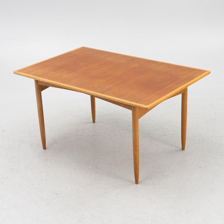 A teak and oak dining table, Scandinavia, 1960's.