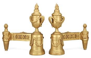 A pair of Louis XVI 18th Century bronze chenets.