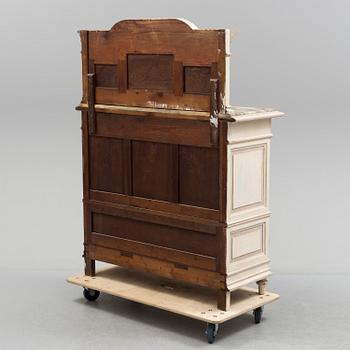 a Louis XVI-style sideboard from the 20th century.