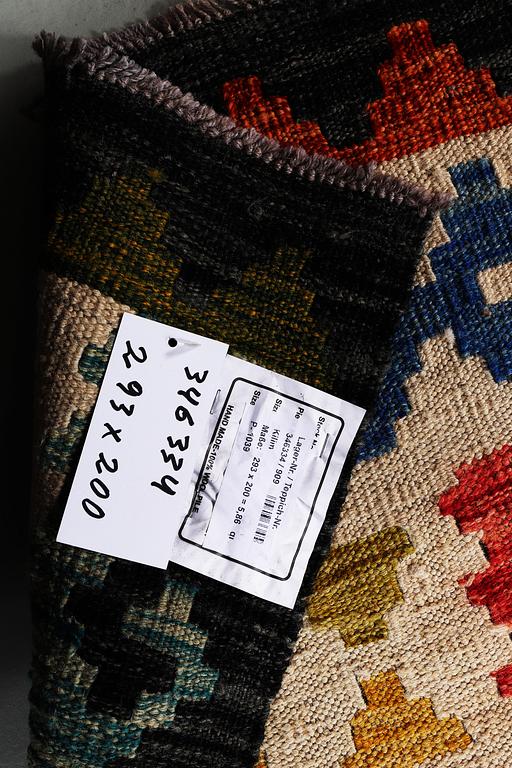 A carpet, Kilim, ca 293 x 200 cm.