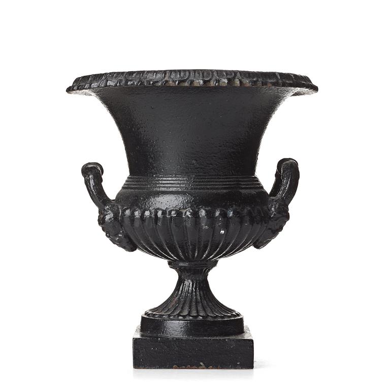 A Louis XVI-style garden urn, circa 1900.