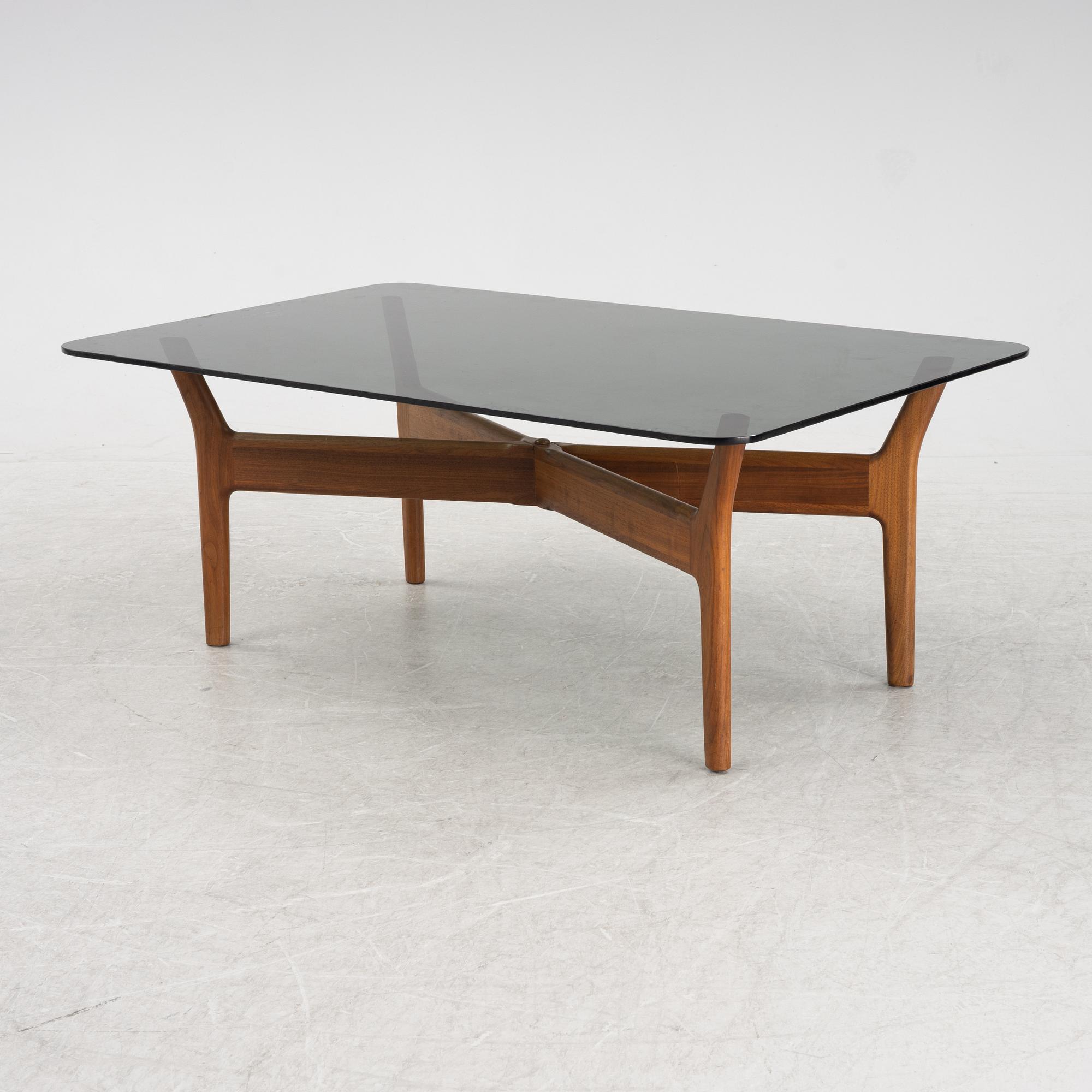 Alf Svensson, a walnut and glass coffee table, Bra Bohag, designed in 1966.