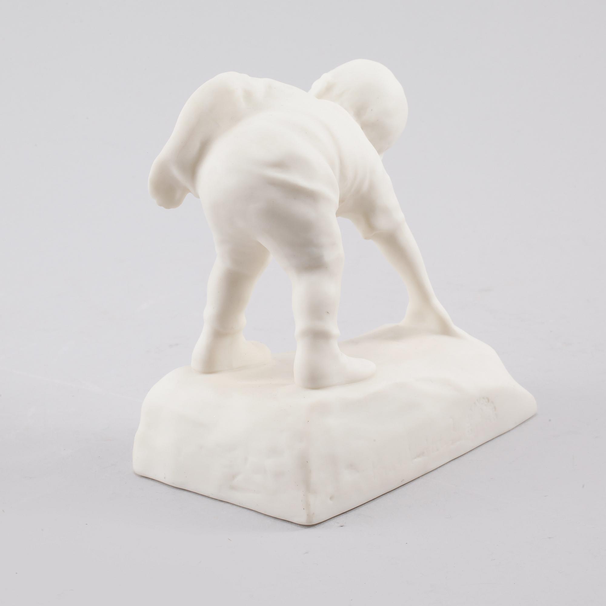 FIGURIN, parian, "Duktig Karl", Karl Hultström, tillverkningsår 1916-1926, signerad.