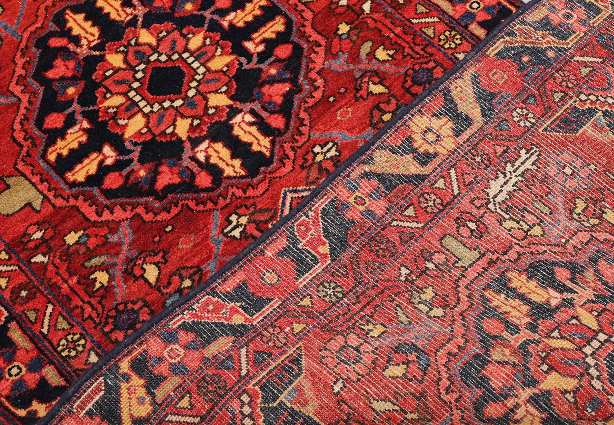 A semi-antique Heriz runner, c. 340 x 92 cm.