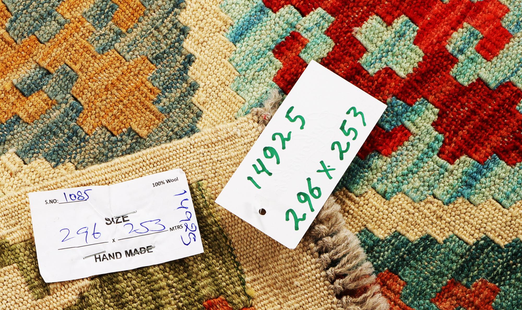 A Kilim carpet, c. 296 x 253 cm.