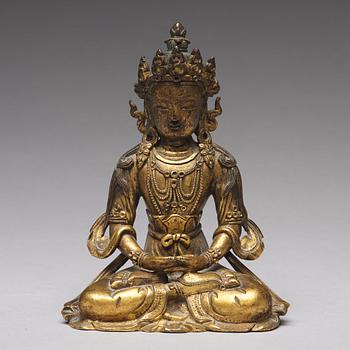 A gilt bronze figure of Amitayus buddha, Tibeto-Chinese, 18th Century.