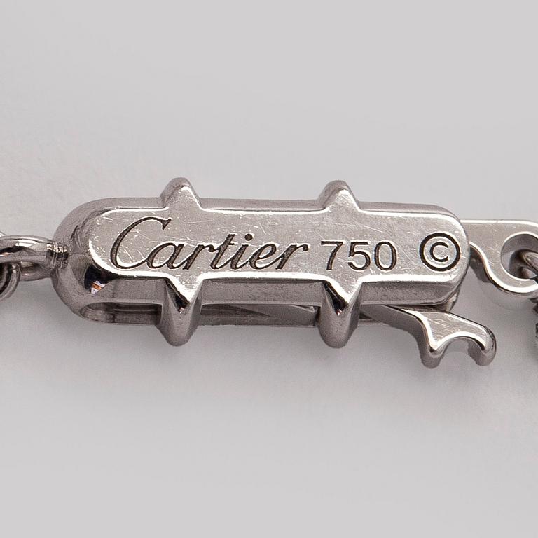 Cartier, an 18K white gold '1895' necklace with a brilliant-cut diamond.
