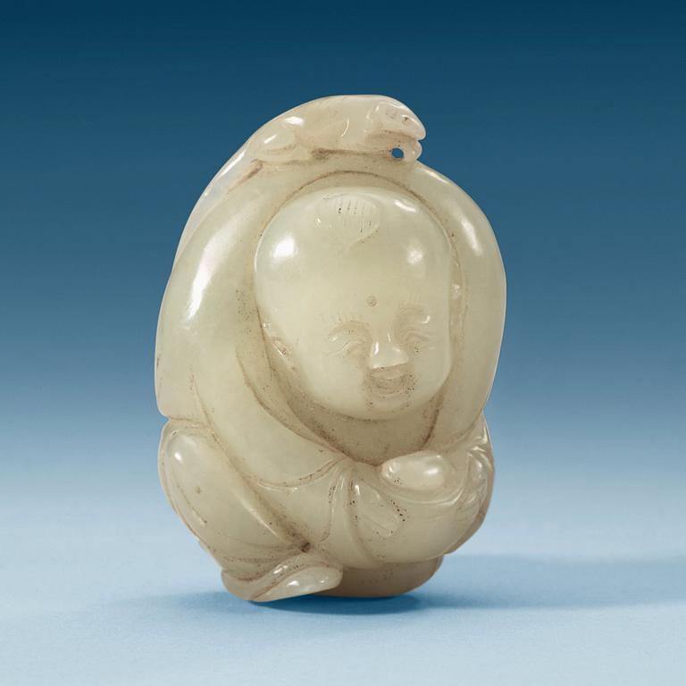 A Chinese nephrite figure of a boy.