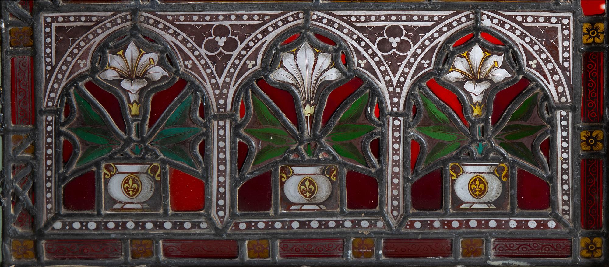 A stained glass window with St Theresa, late 19th Century.