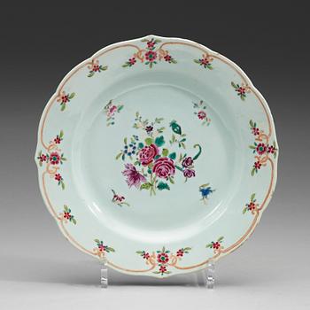 481. A group of export porcelain 12 famille rose dinner plates, Qing dynasty, Qianlong (1736-1795).