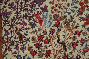 A CARPET, a semi-antique Tabriz probably, ca 393 x 284 cm.