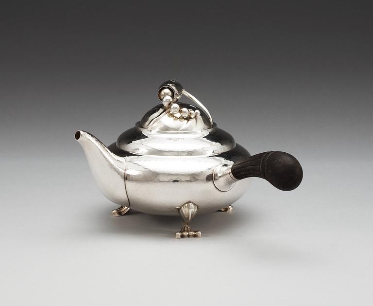 A Georg Jensen sterling 'Blossom' tea-pot, design nr 2D by Georg Jensen, Copenhagen 1996.