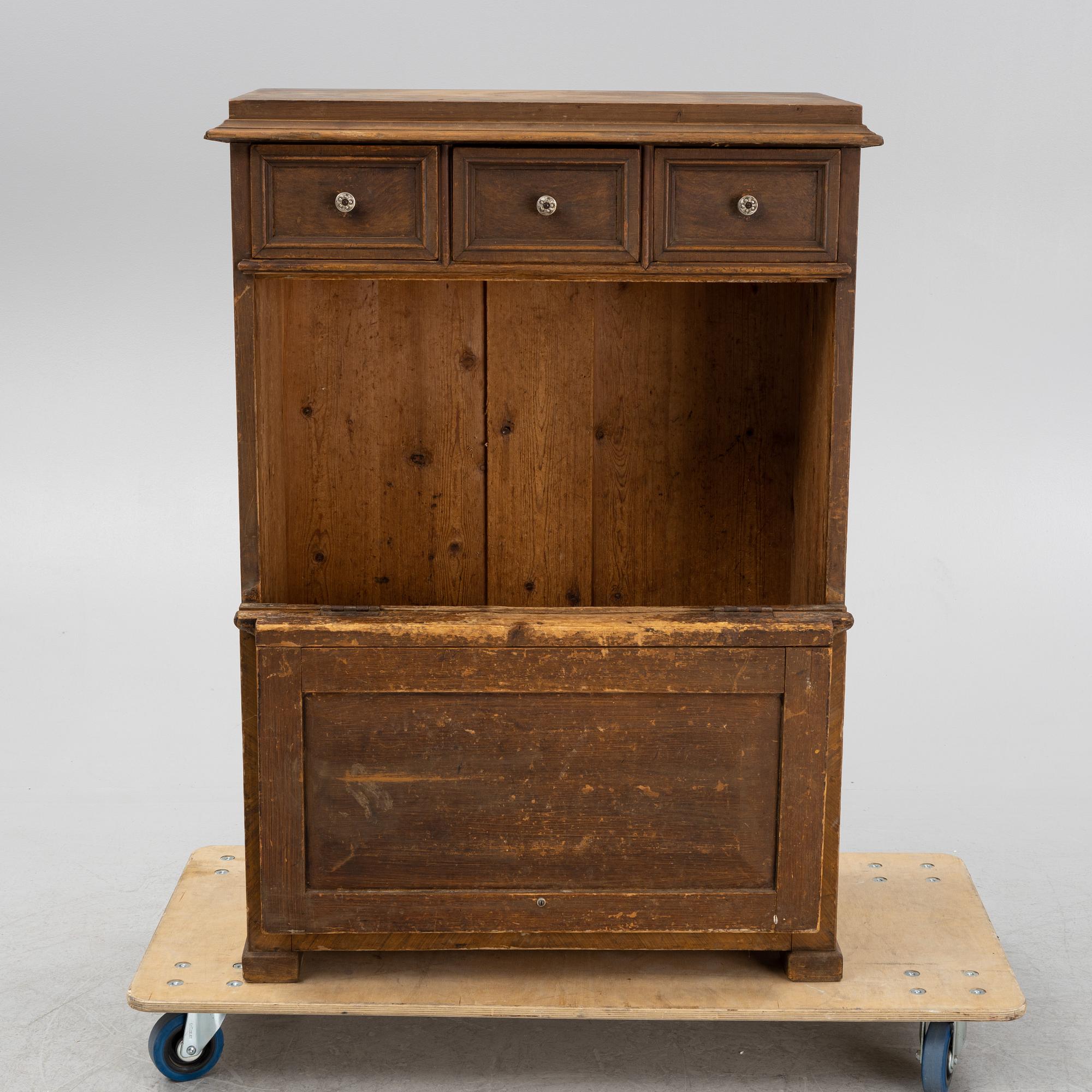 A wooden fire wood box, around 1900.