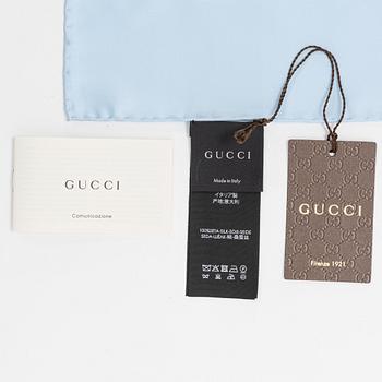 Gucci, a 'Flora' twill silk scarf.
