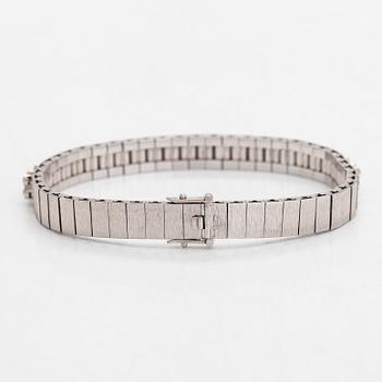 An 18K white gold bracelet, with round brilliant-cut diamonds totalling approximately 1.44 ct. Swedish import stamp.