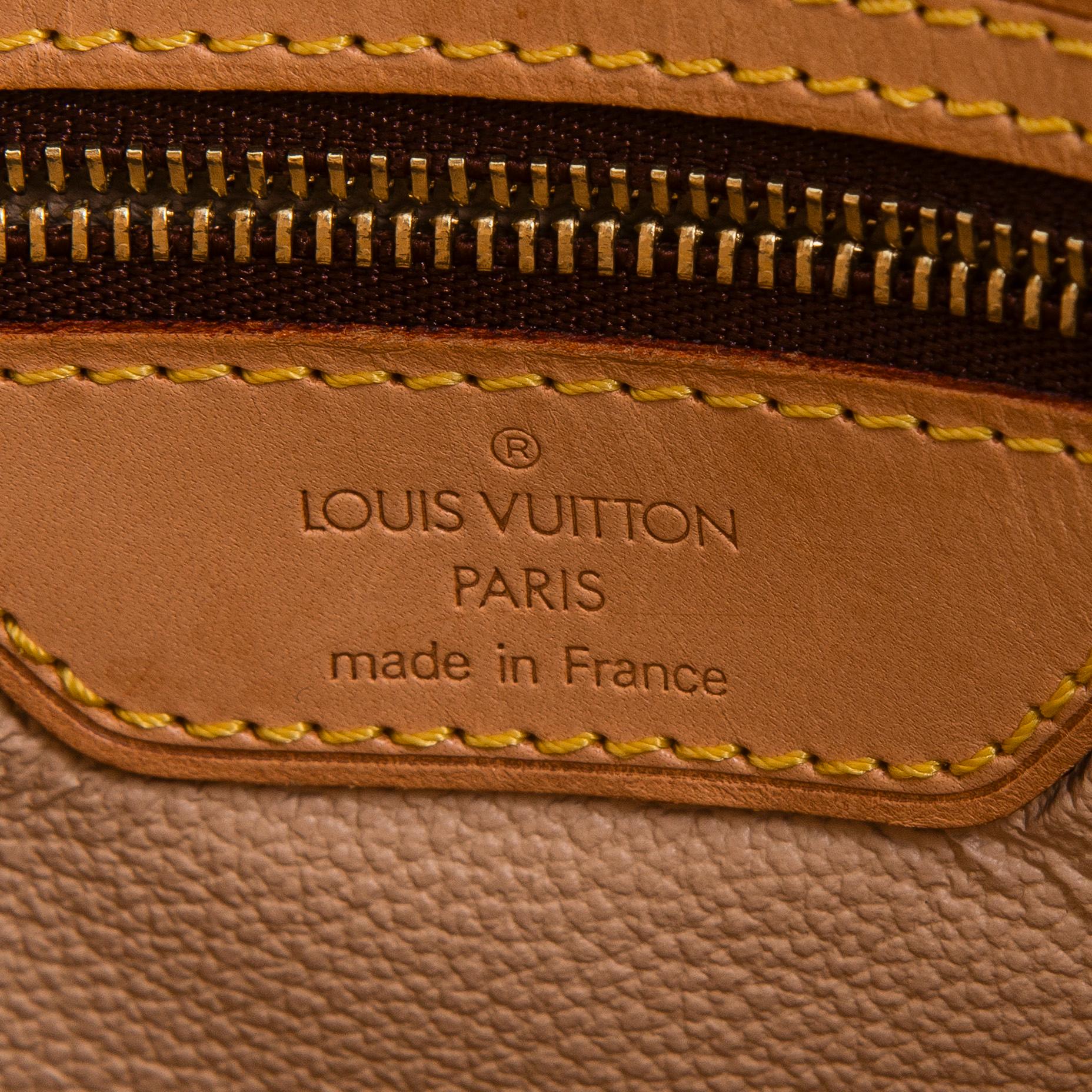 Louis Vuitton, a Monogram Canvas "Bucket" bag and pochette.