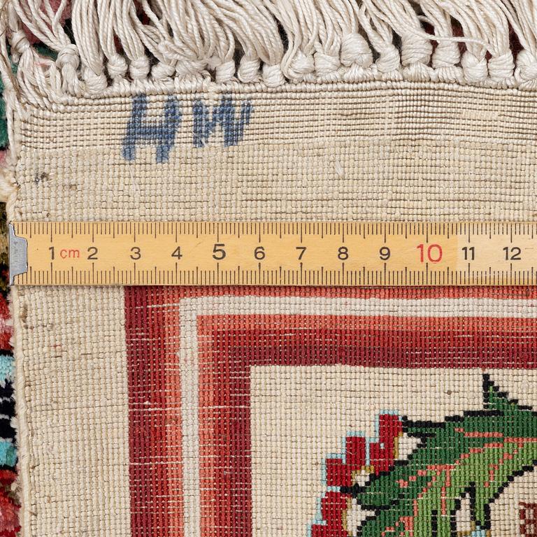 A silk Qum rug, central Persia, c. 213 x 135 cm.