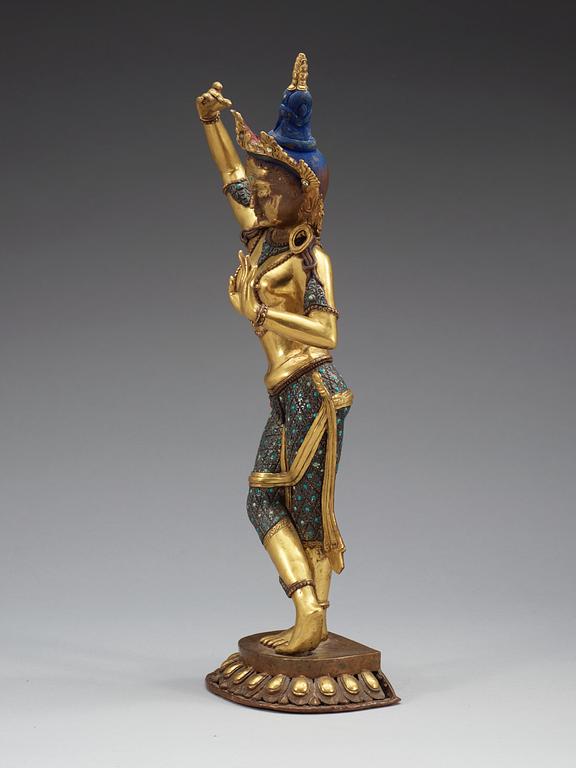 A gilded and silver plated bronze figure of standing Tara, Nepal, presumably early 20th Century.