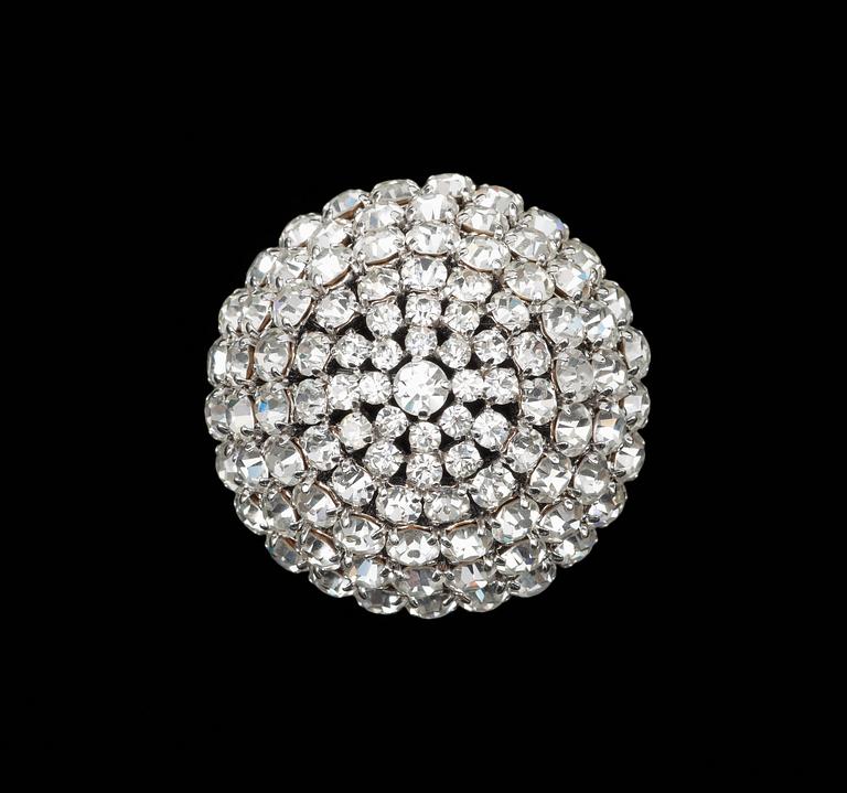 A 1961s brooch by Christian Dior.