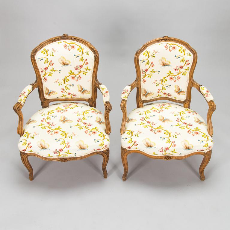 Two French, mid-18th-century Louis XV open armchairs.