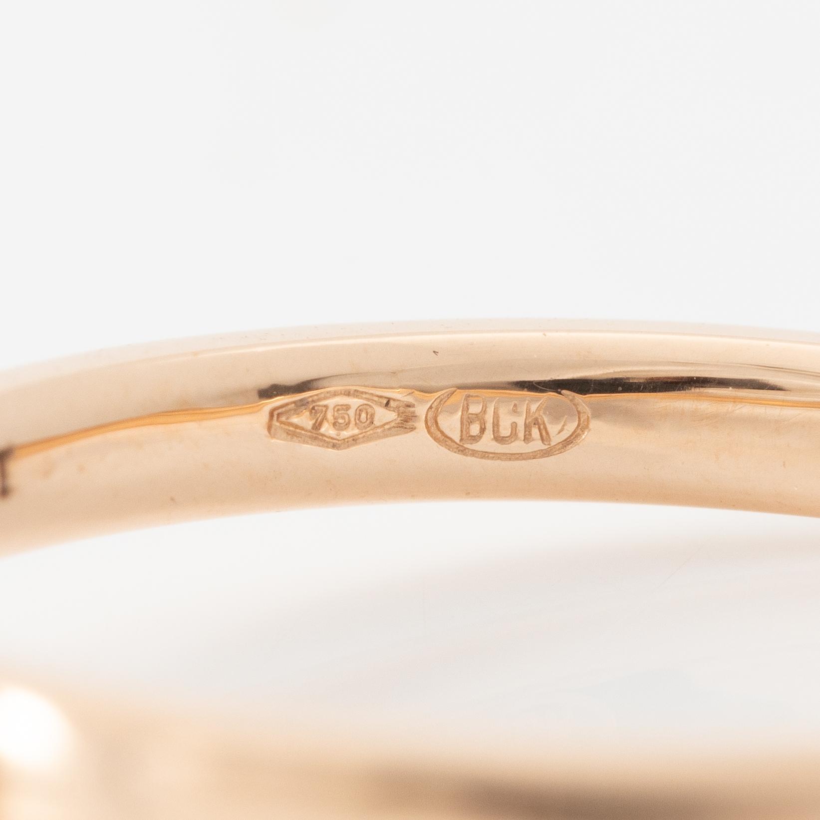 Ring 18K guld med briljantslipad diamant. Medföljande IGI report.