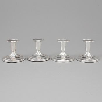 A set of four silver Candlesticks,
