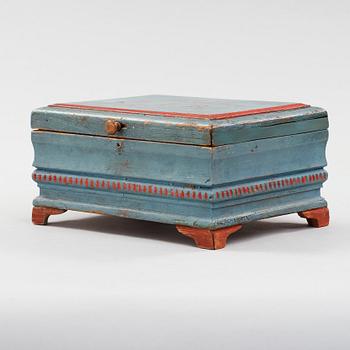 a wooden box marked JJD 1814.