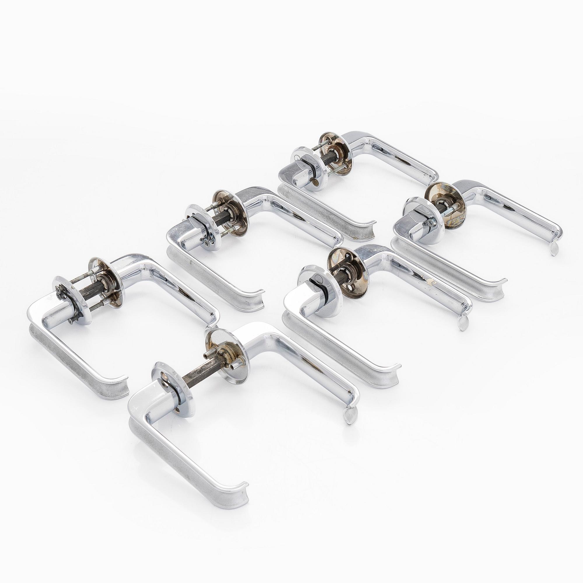 A set of six 1960s-1970s door handles.