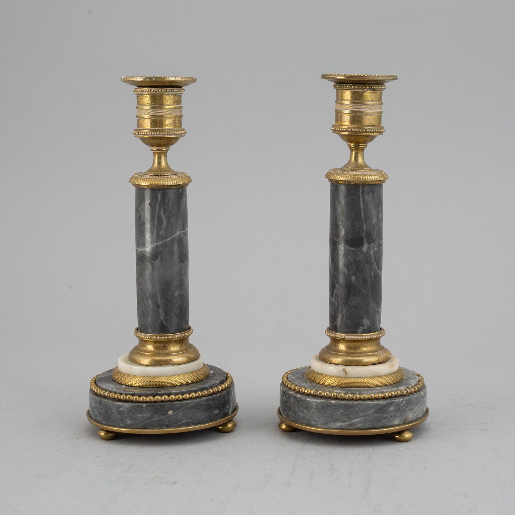 A pair of French ca 1800 candlesticks.
