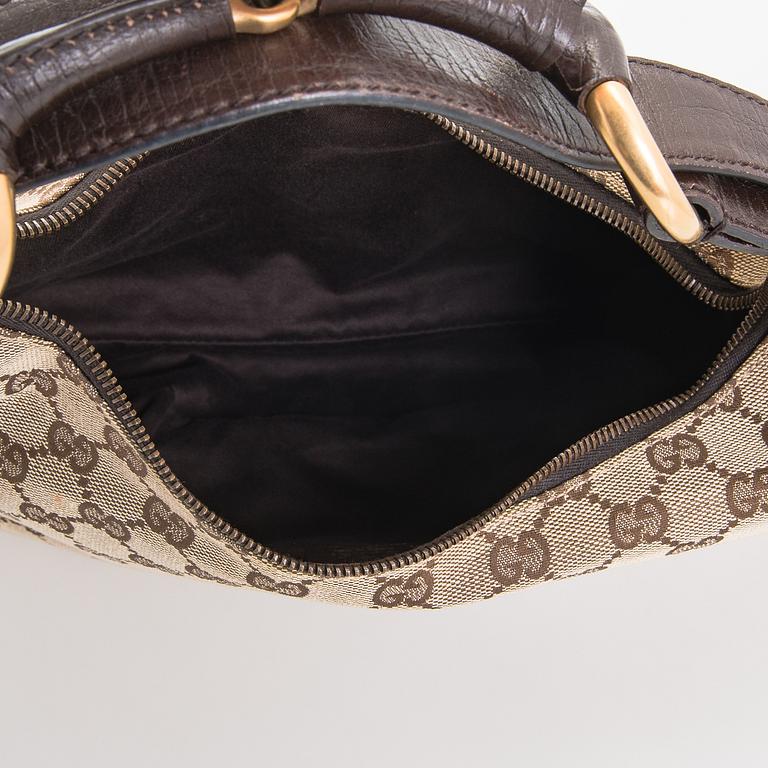 Gucci, a 'Horsebit GG Canvas Hobo Bag'.