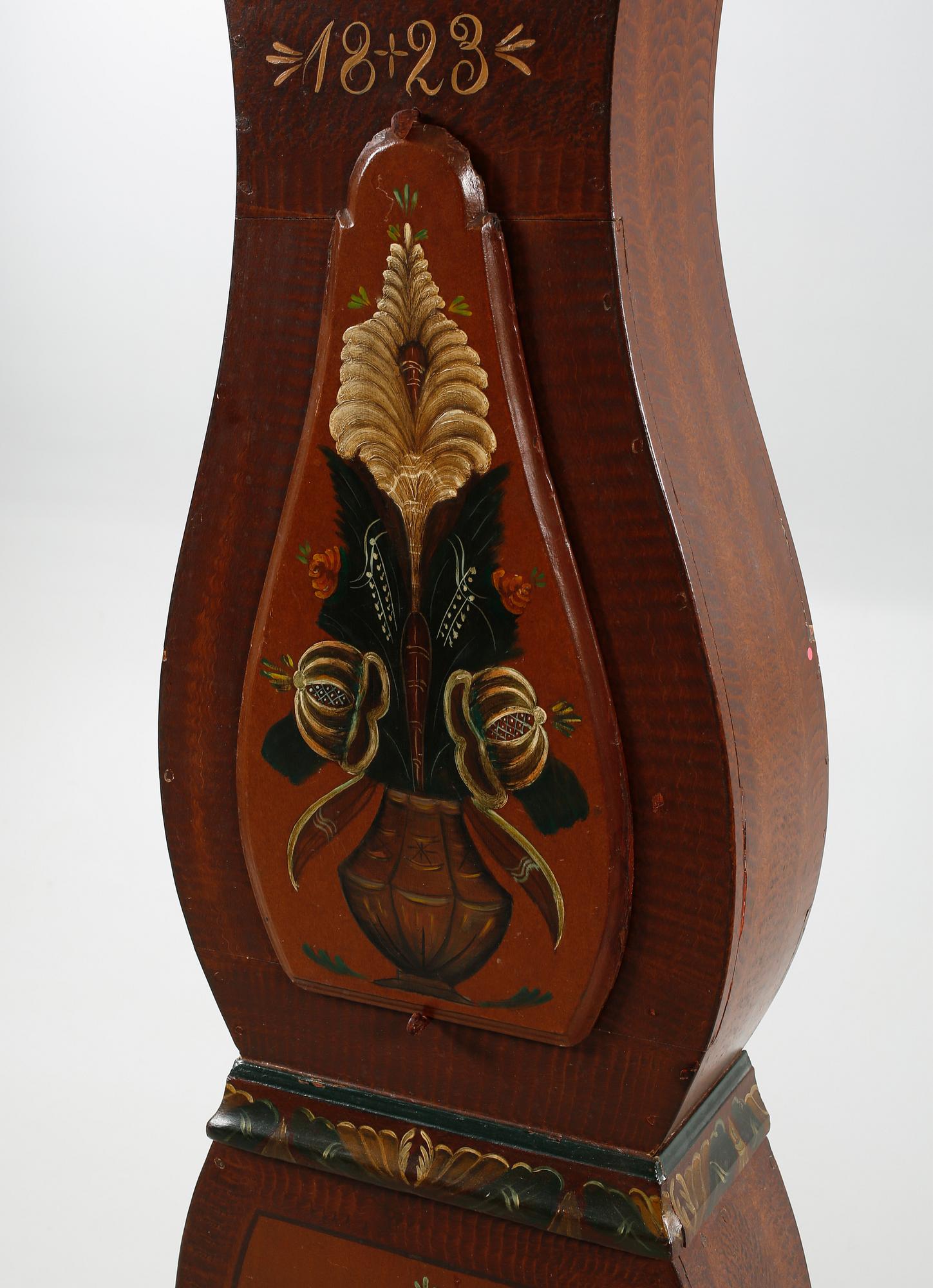 A grandfather clock dated 1823.