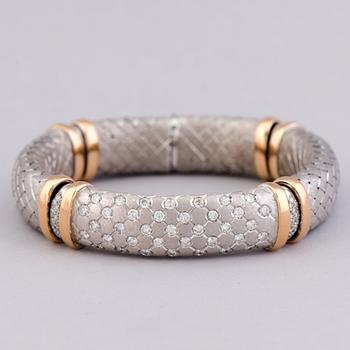 ARMBAND, briljantslipade diamanter, 18K vitguld och guld. Italien.