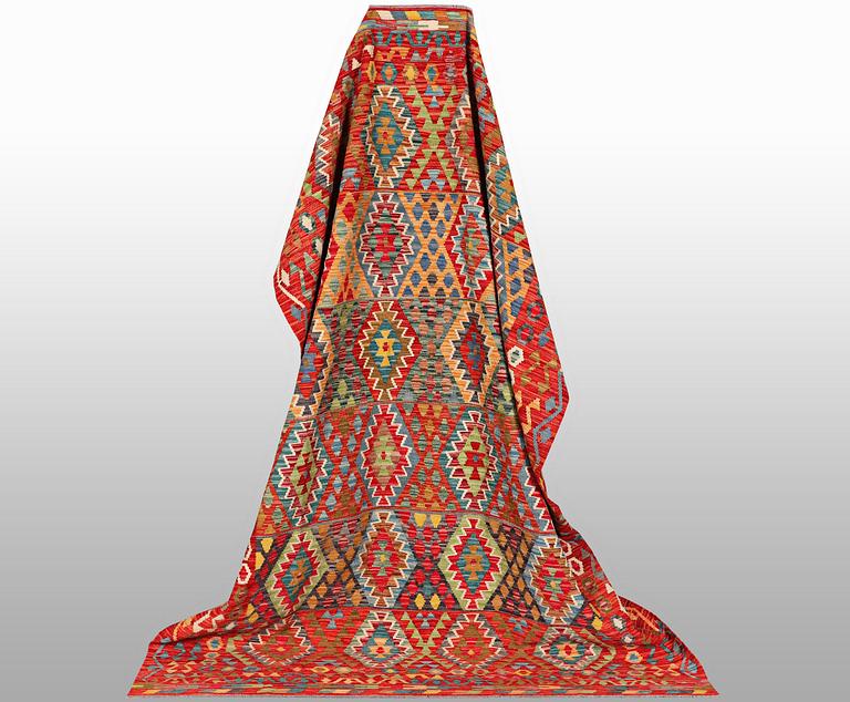 A carpet, kilim, ca 297 x 202 cm.