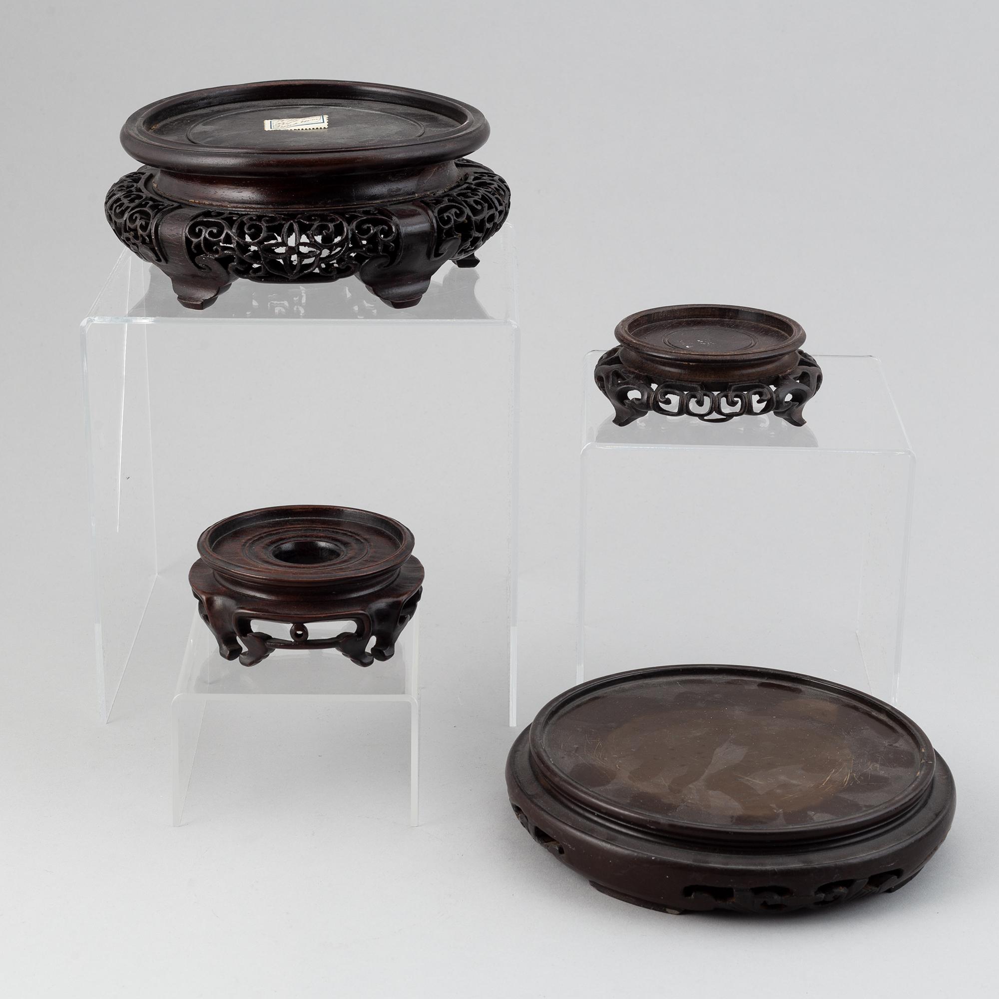 A group of chinese wooden stands, 19th/20th Century. (12 pieces).