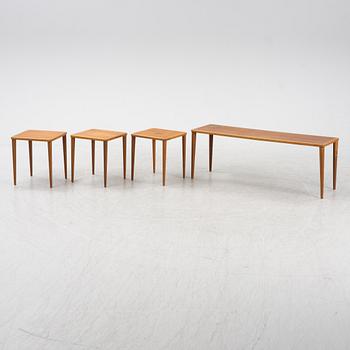 A four piece nesting table, mid 20th century.