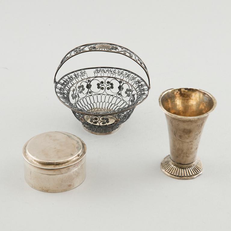 A silver box, a beaker and a basket, partly Sweden, 19th century.