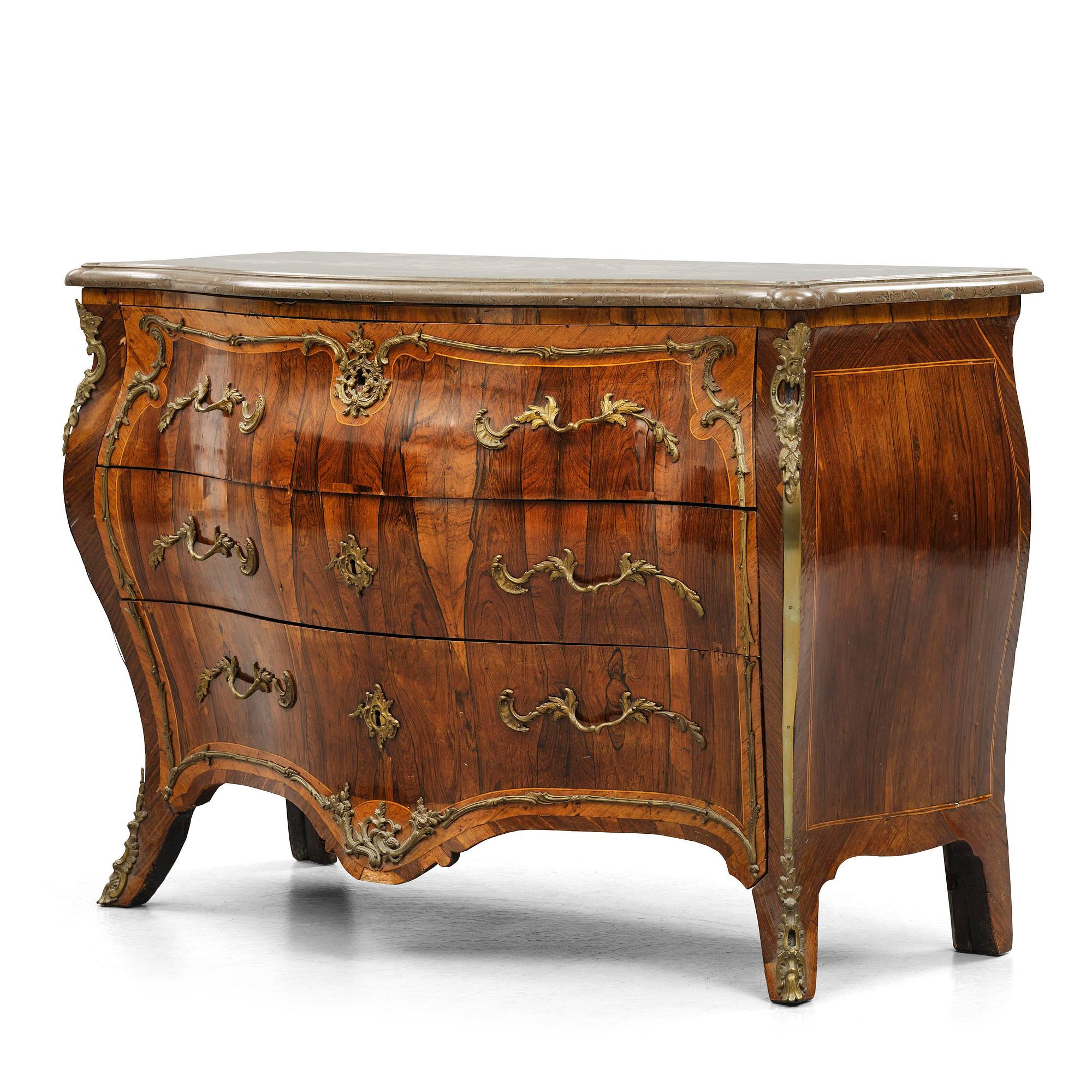 A rococo parquetry commode by C. G. Willkom (master in Stockholm 1763-65).