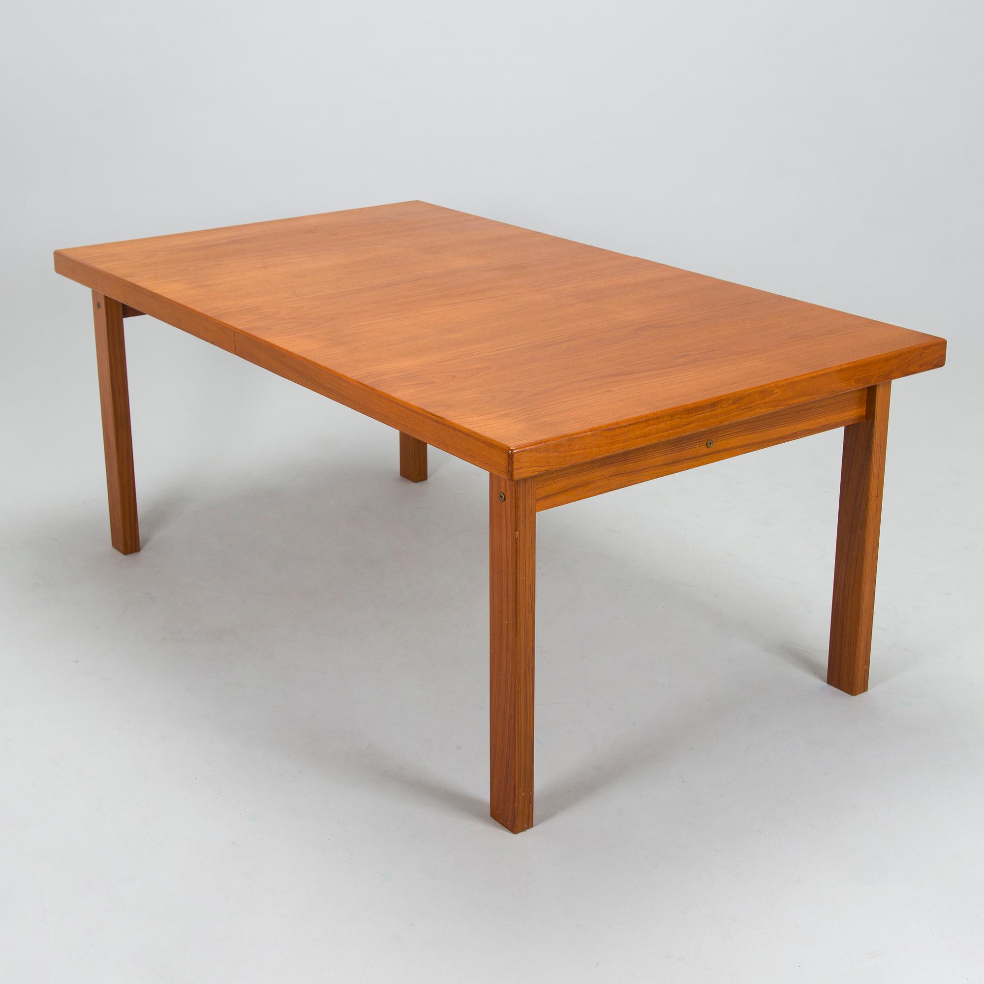 A mid-20th century dining table.