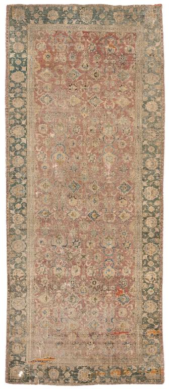 A safavid 'Spiral vine' Esfahan carpet, central persia, mid to second haft of the 17th century. Ca 562 x 231 cm.